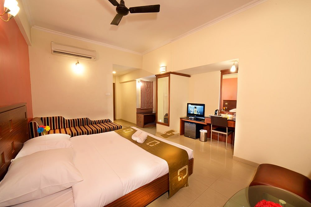 Deluxe Room at Plaza Inn for a comfortable stay
